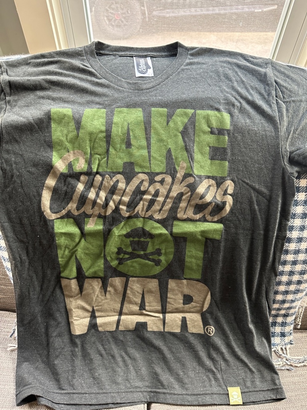 Johnny Cupcakes Black Tee with Green and Cream 'Make Cupcakes Not War' Graphic